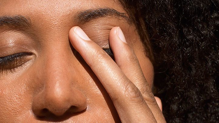 woman pain vision eyes black african-american