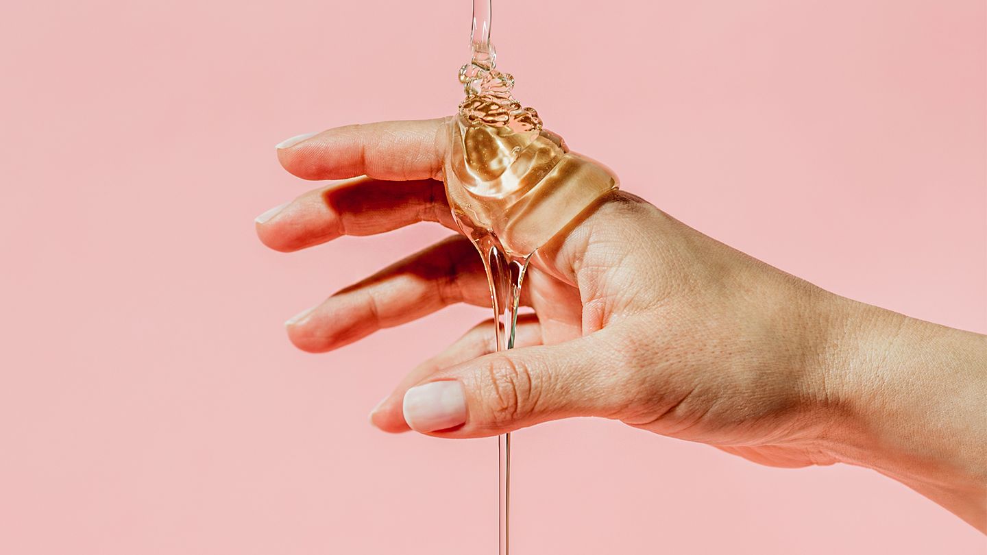 honey poured on hand